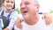 Grandparents Giving Grandchildren Piggyback Ride In Garden