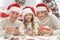 Grandparents with grandchild preparing for Christmas together