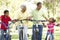 Grandparents With Grandchildren Riding Bikes