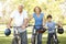 Grandparents And Grandson On Cycle Ride