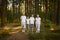 Grandparents and grandsons in forest