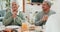 Grandparents, parents and children praying over food while eating together as a family during a visit. Kids, gratitude