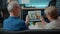 Grandparents talking to family on online conference chat