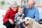 Grandparents with their grandson and pet retriever