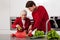 Grandson helping in kitchen