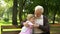 Grandson runs up to grandfather, embraces him, secured old age and family values