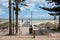 The grange jetty with a blue sky and white fluffy clouds looking