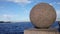 Granite ball on the embankment