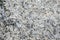 Granite, basalt or marble stone crystal texture of polished gravestone