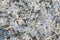 Granite, basalt or marble stone crystal texture of polished gravestone