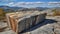 Granite boulder in the desert with mountain lanscape on a sunyy day