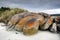 Granite boulders under storm at Tasmanian beach