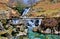 Granite Bridge over Cascading Waterfalls by the Watkins path on the Afon Cwm Llan, Snowdon