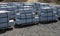 Granite curbs of cut granite. smooth stoneware products stacked on a pallet ready for transport to the construction site. curbs va
