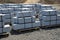 Granite curbs of cut granite. smooth stoneware products stacked on a pallet ready for transport to the construction site. curbs va