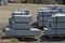 Granite curbs of cut granite. smooth stoneware products stacked on a pallet ready for transport to the construction site. curbs va