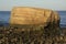 Granite, glacial boulder with stones on beach, Hammonasset, Madi