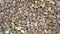 Granite gravel of macadam, Rock brown crushed for construction on the ground, Scree texture background.