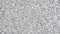 Granite gravel texture. Road surface made with small gravel. Textured gray pebbles. Crushed material background