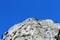 Granite rocks mountain walls in an alpine valley