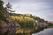 Granite rocks with woods of coastline and islands in North Europe, Baltic sea, gulf of Finland. Clean nordic nature in autumn