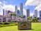 Granite sign and Parliament house building in Singapore