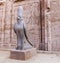 Granite statue of God Horus falcon at entrance Temple of Horus, Edfu, Egypt. Famous landmark ptolemaic Horus Temple in Idfu