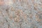 Granite texture, granite slab background, grey marble stone. Decorative element of old building fasade. Empty space for