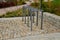 Granite walls made of stone blocks serve as design elements, retaining walls, or seating areas, seats for park visitors. parking f