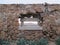 Granite window in old fortification with sea panorama, Caprera I