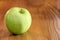 Granny smith apple on table