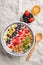 Granola bowl with berries, fruits and natural yogurt