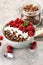 granola healthy breakfast with natural yogurt, muesli and berries