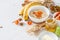 Granola ingredients on white wood background