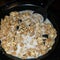 Granola milk raisins bowl spoon