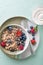 Granola oatmeal with fresh berry fruit and yogurt
