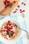 Granola with yoghurt and wild strawberries