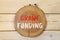 Grant funding symbol. Concept words Grant funding on beautiful wooden circle. Beautiful wooden wall background. Business and grant