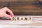 Grant. Wooden letters on the office desk
