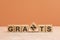 GRANTS text on a wooden blocks, orange background