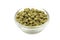 Granulated green hops in a glass bowl