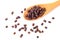 Granules of bee bread in a wooden spoon are isolated on a white background. Apitherapy. Beekeeping products. Strengthening immunit