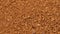 Granules of instant aromatic brown coffee background.