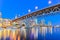 Granville Bridge and Vancouver BC skyline reflection at blue hour in Canada