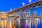 Granville Bridge and Vancouver BC skyline reflection at blue hour in Canada