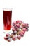 Grape cluster and juice in glass