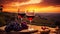 Grape field at sunset, bunches of grapes and glasses of red wine