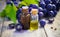 Grape seed oil in a small jar. Selective focus.