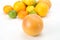 Grapefruit on the background of different citrus fruits on white background