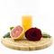 Grapefruit - fruit and juice on wooden board with rose flower